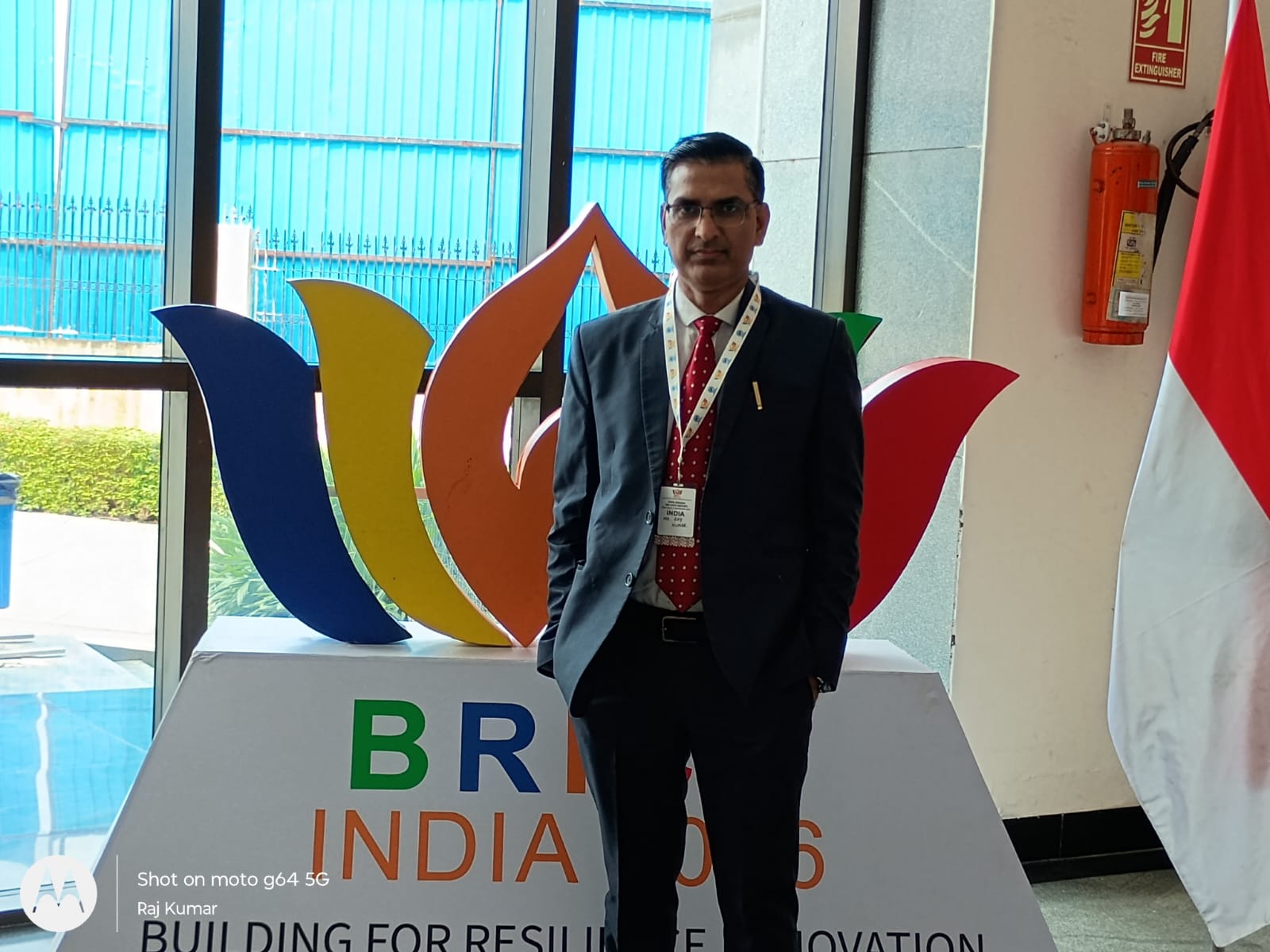 Raj Kumar at the BRICS India 2026 venue branding during the 18th BRICS HIPO Meeting