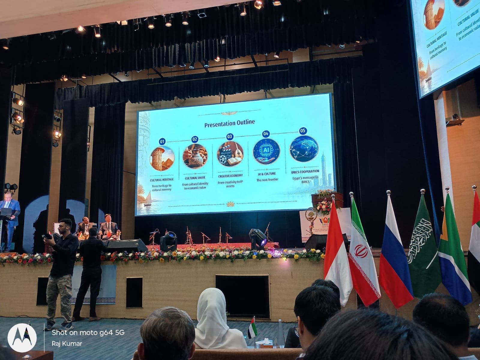 Delegates and BRICS member country flags at the plenary hall of the 18th BRICS HIPO Meeting in New Delhi